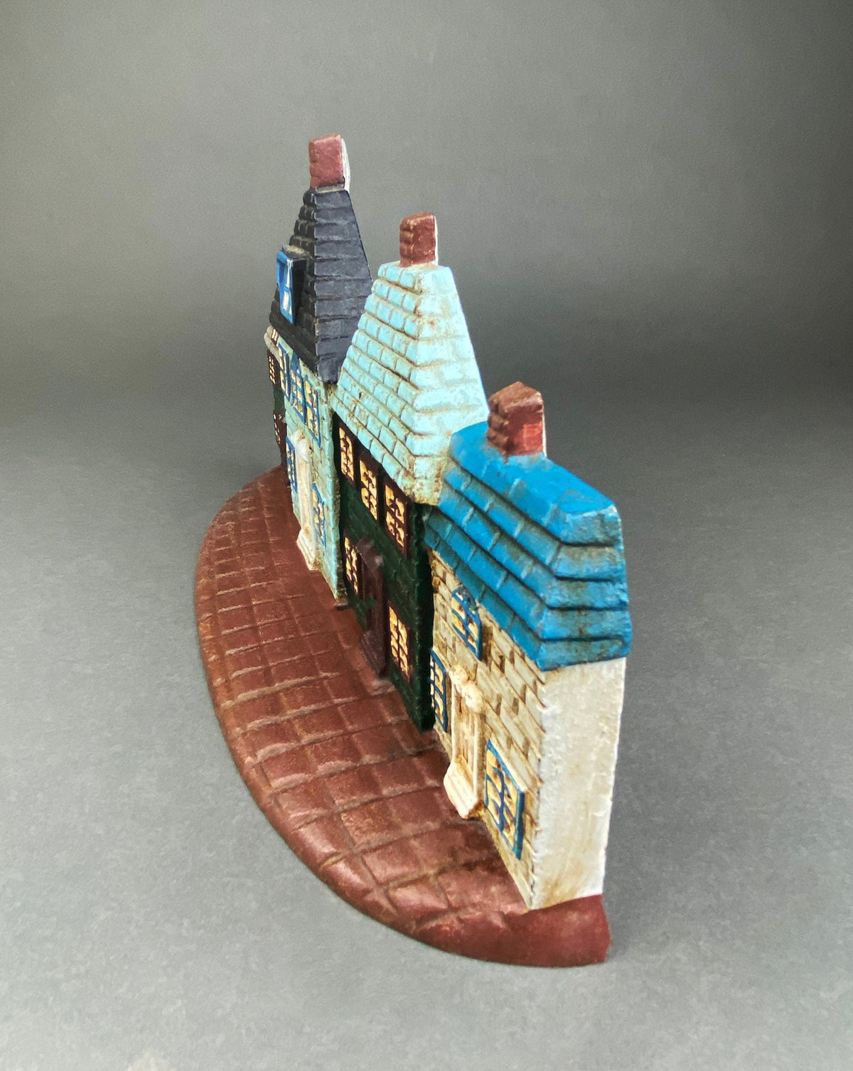 Vintage Cast Iron Door Stopper Shaped like Row of Houses