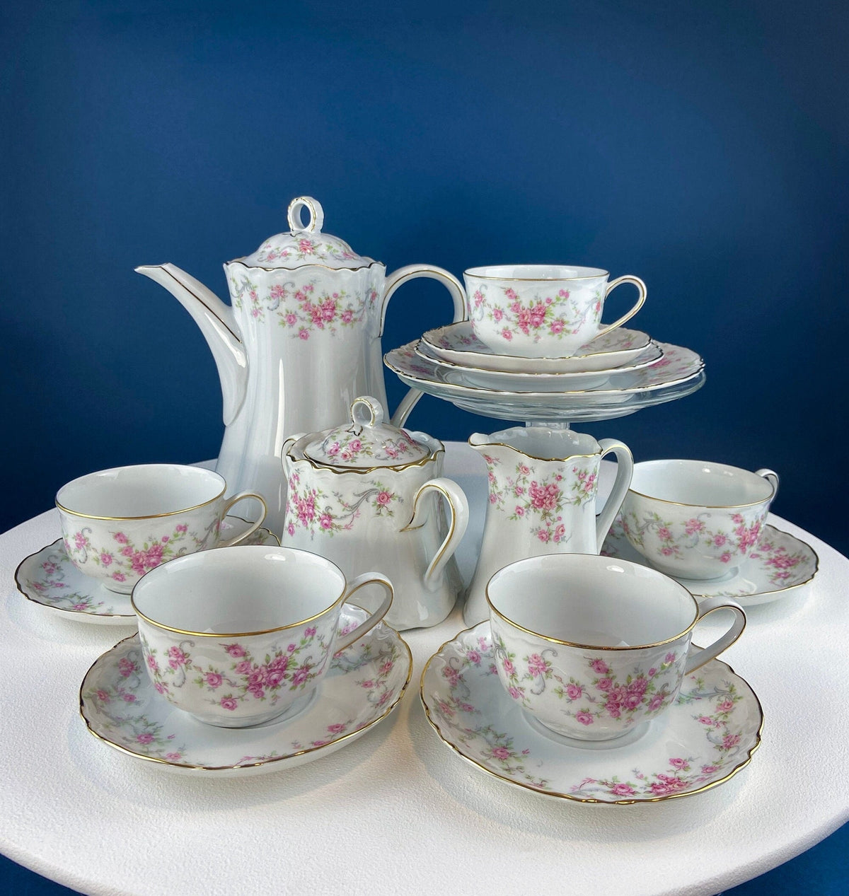 Antique Porcelain Serving Dishes. Set of Five Hutschenreuter Platters and Bowls with Pink Rose Garlands Motif.