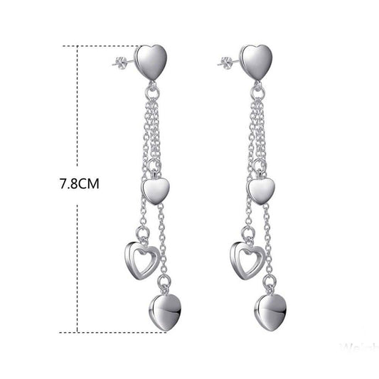 Long Dangling Heart Earrings in White Gold