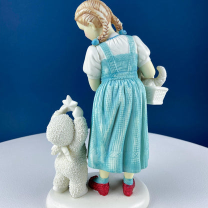 Dorthy in Wizard of Oz with Toto & Snowbabies. Dept. 56 Premiere Edition, Guest Collection. Collectible Porcelain Figurine.