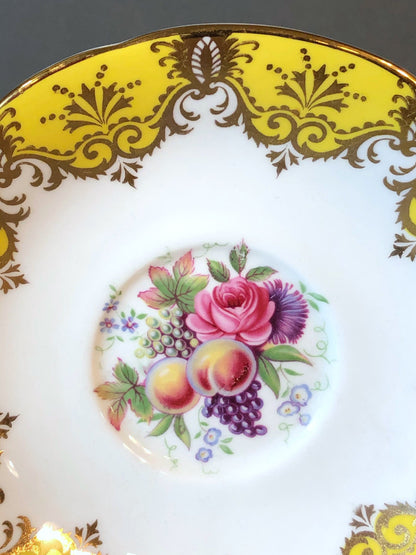 Tea Cup and Saucer by Paragon Made in England in Yellow, Gold, Pink