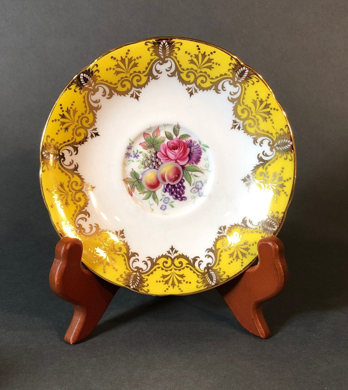 Tea Cup and Saucer by Paragon Made in England in Yellow, Gold, Pink
