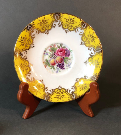 Tea Cup and Saucer by Paragon Made in England in Yellow, Gold, Pink