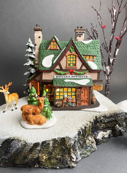 Christmas Village Farm House with Red Roof. Illuminated Building Holiday Decoration.