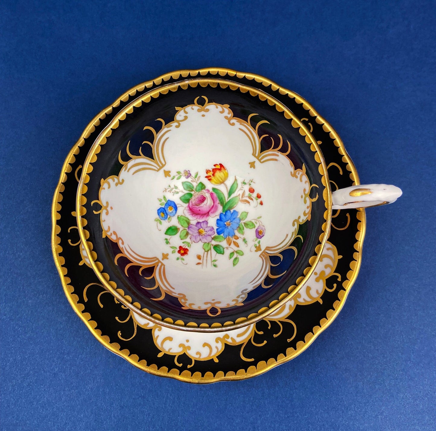 Vintage Tuscan Teacup and Saucer in Black, White and Gold Floral Pattern