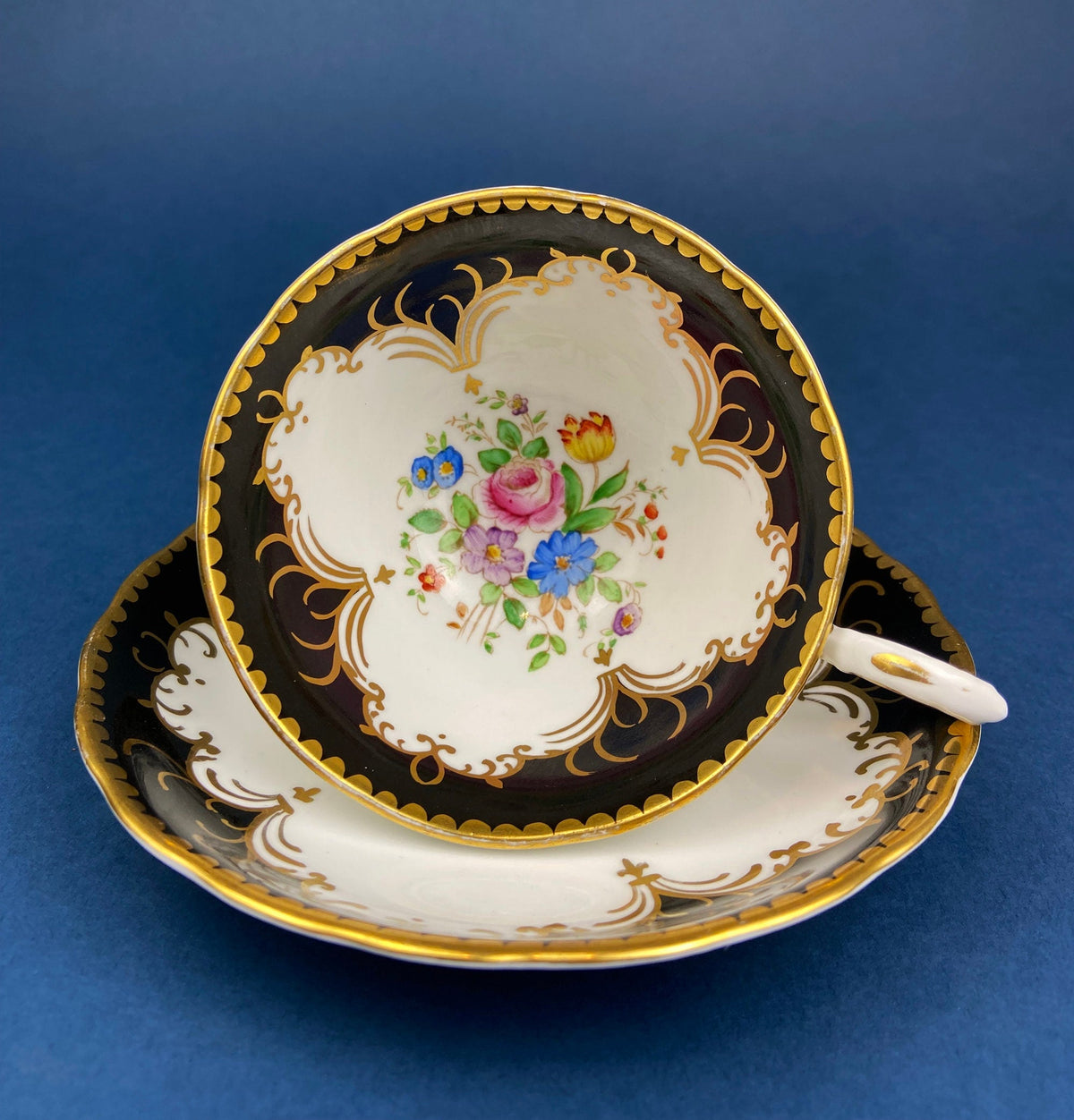 Vintage Tuscan Teacup and Saucer in Black, White and Gold Floral Pattern