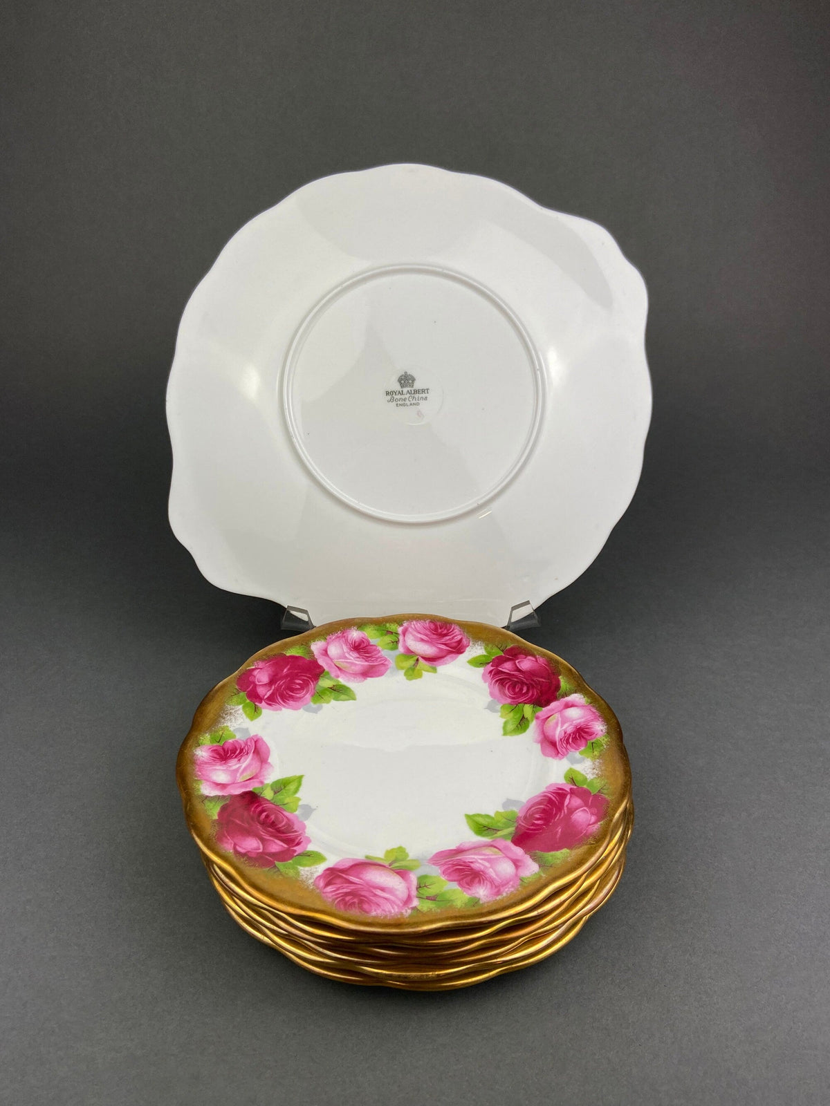 Royal Albert Set of Six Dessert Plates and One Serving Plate  with Old English Rose Pattern.  Made in England.