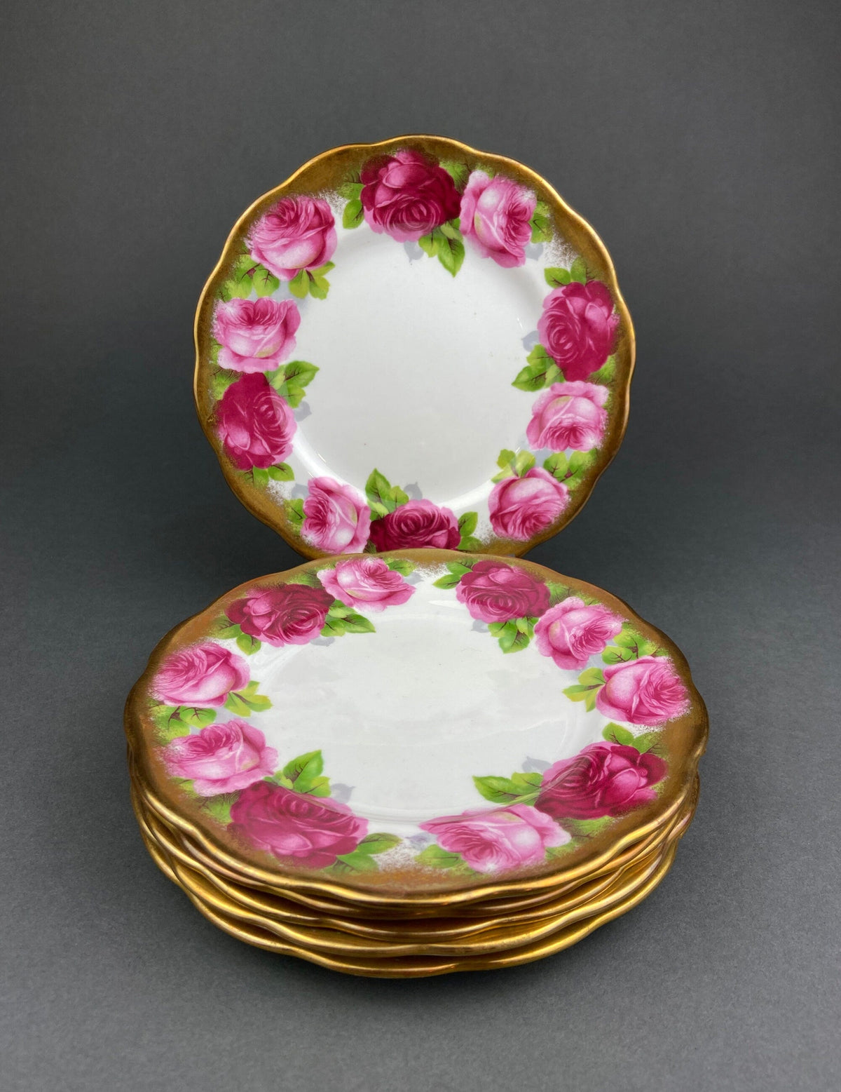 Royal Albert Set of Six Dessert Plates and One Serving Plate  with Old English Rose Pattern.  Made in England.
