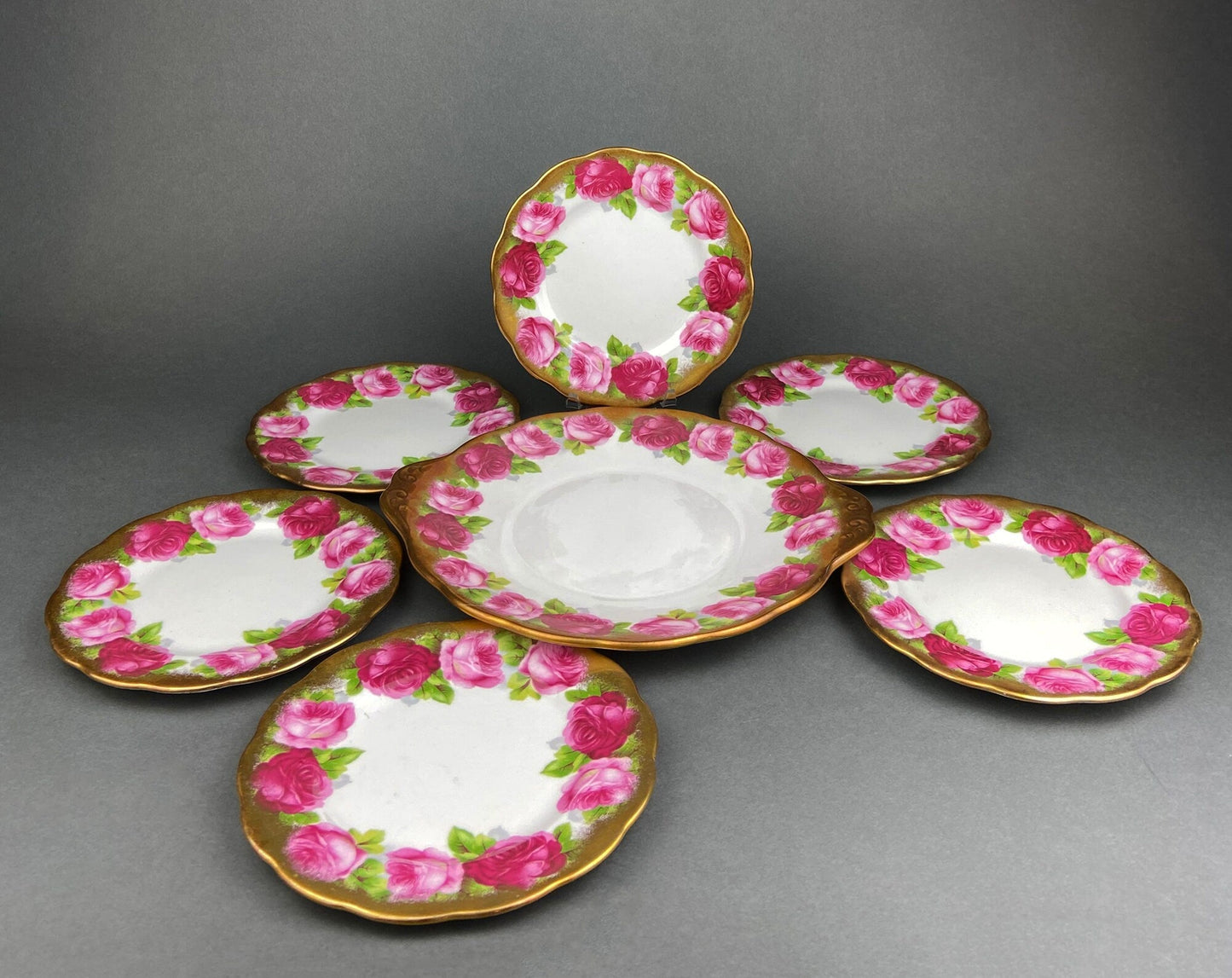 Royal Albert Set of Six Dessert Plates and One Serving Plate  with Old English Rose Pattern.  Made in England.