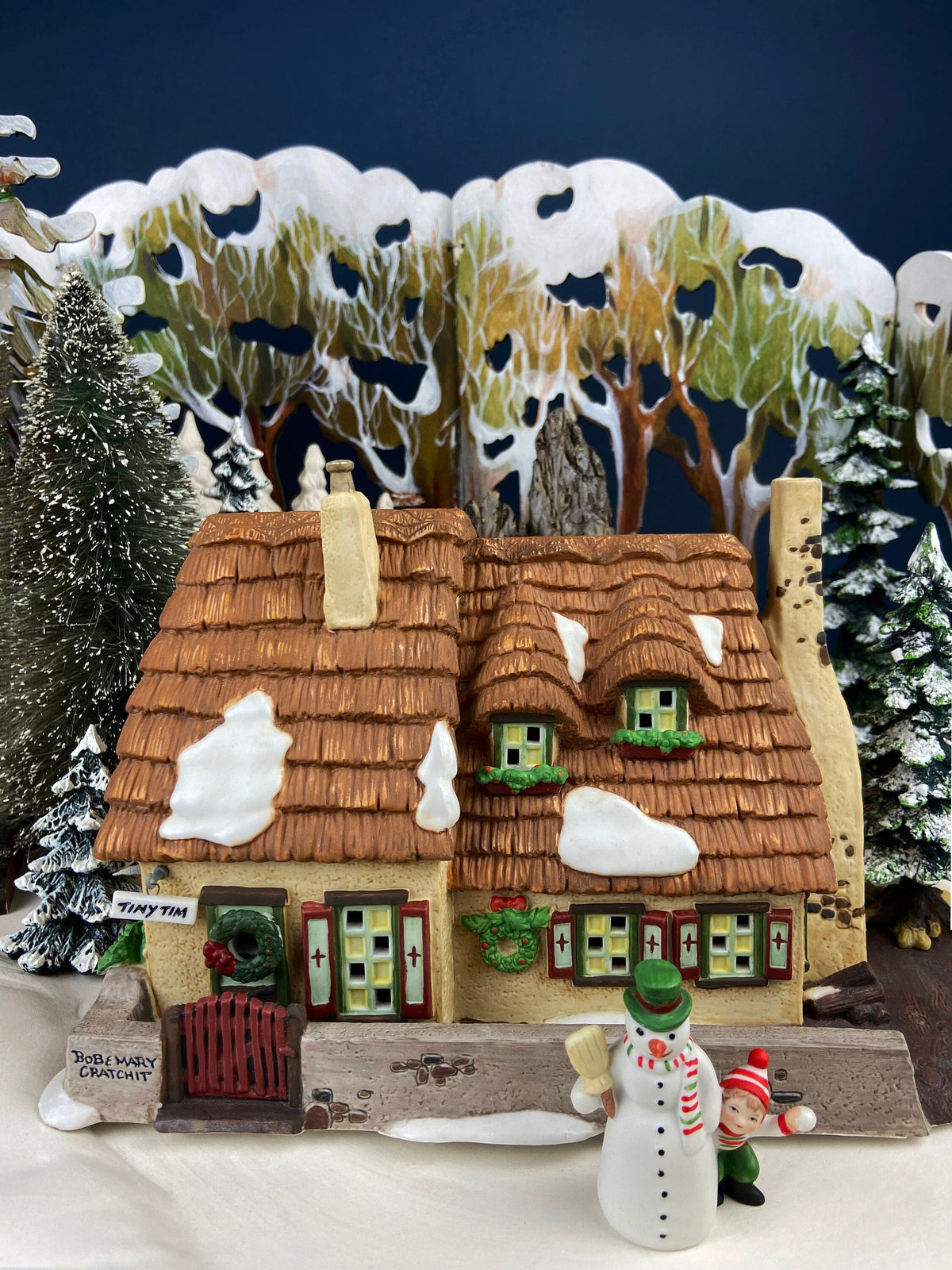 Department 56 Christmas Village Accessories. Illuminated Cottage of Bob Cratchit and Tiny Tim. Dicken's Village Series.