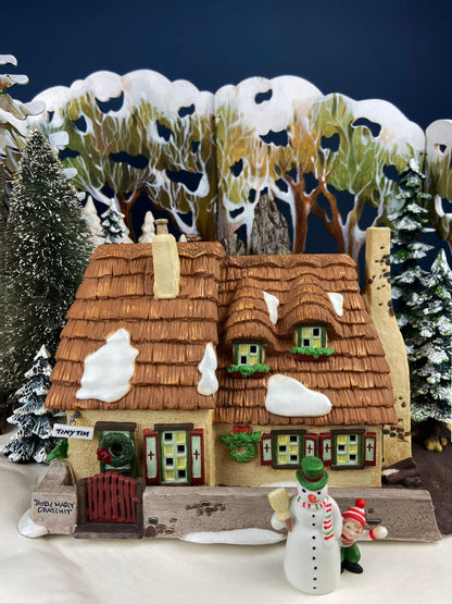 Department 56 Christmas Village Accessories. Illuminated Cottage of Bob Cratchit and Tiny Tim. Dicken's Village Series.