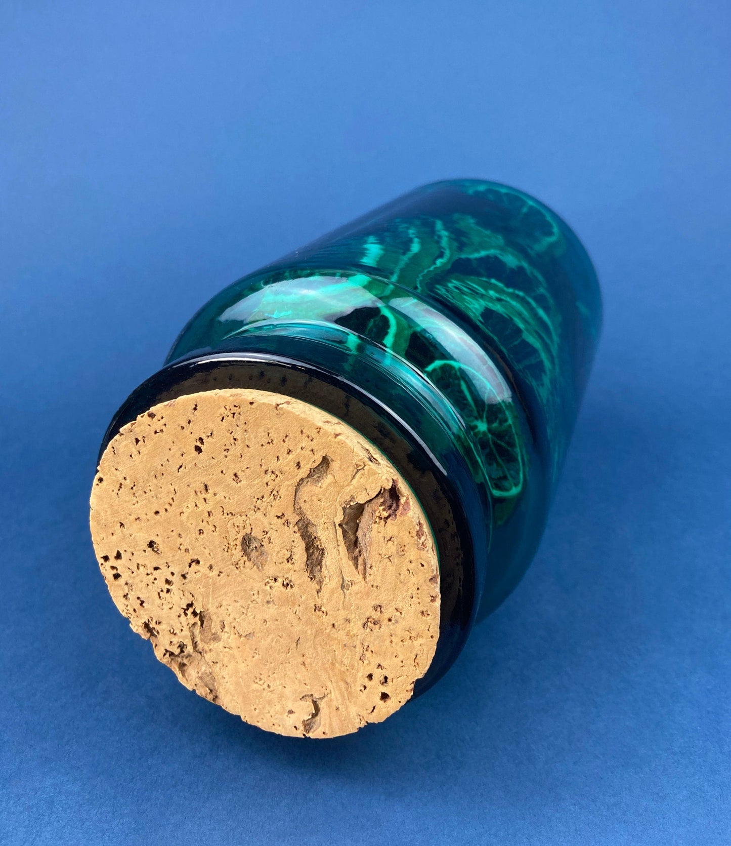 Green Glass Storage Jar with Dried  Orange Slices. Large, Deep Green Glass Canister with Cork Lid. Countertop Container.