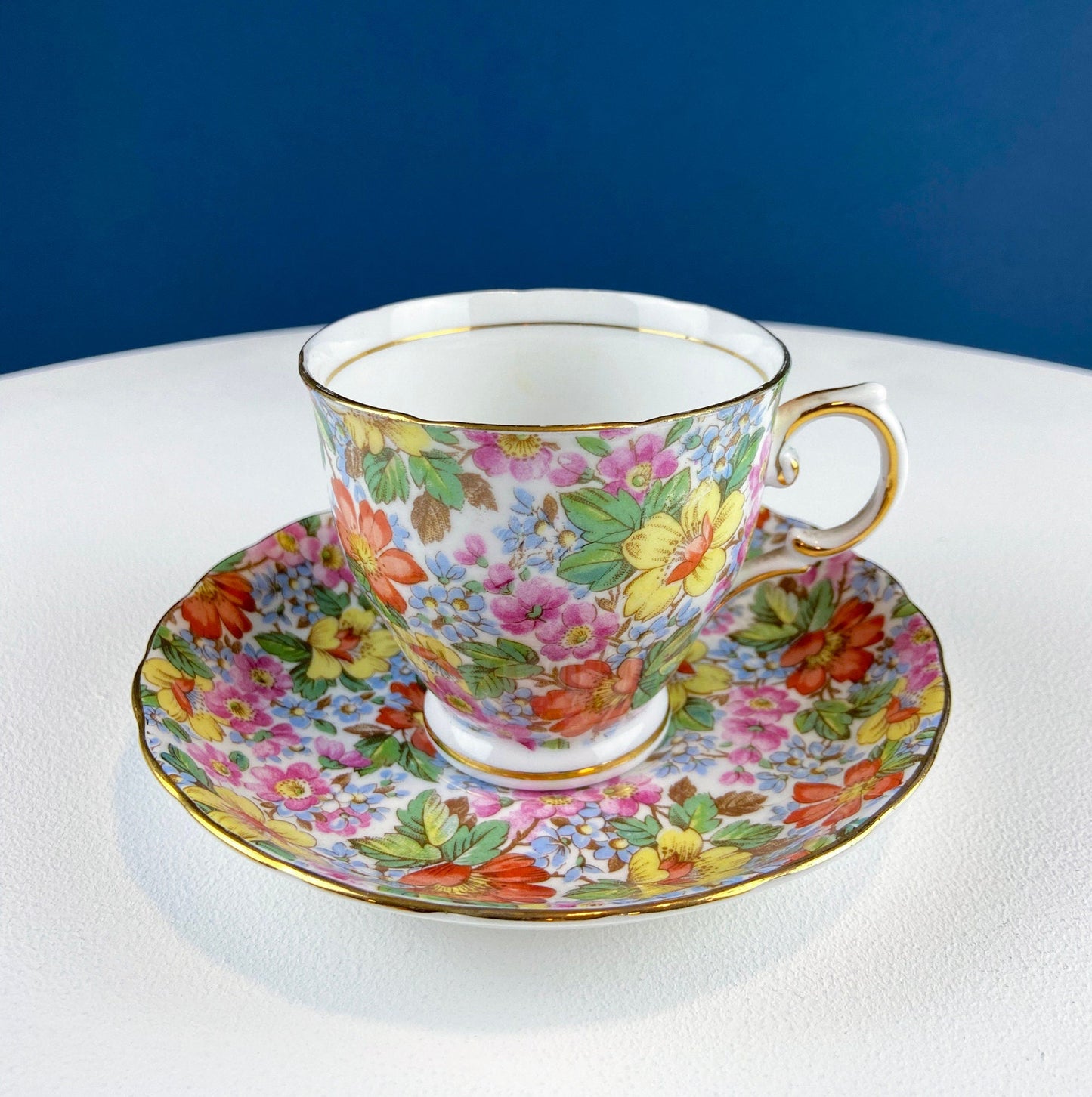 Vintage Tuscan Cup and Saucer: Hand-Painted Floral Tea Set