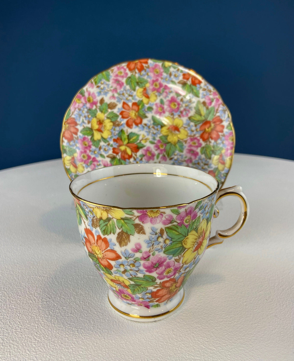Vintage Tuscan Cup and Saucer: Hand-Painted Floral Tea Set