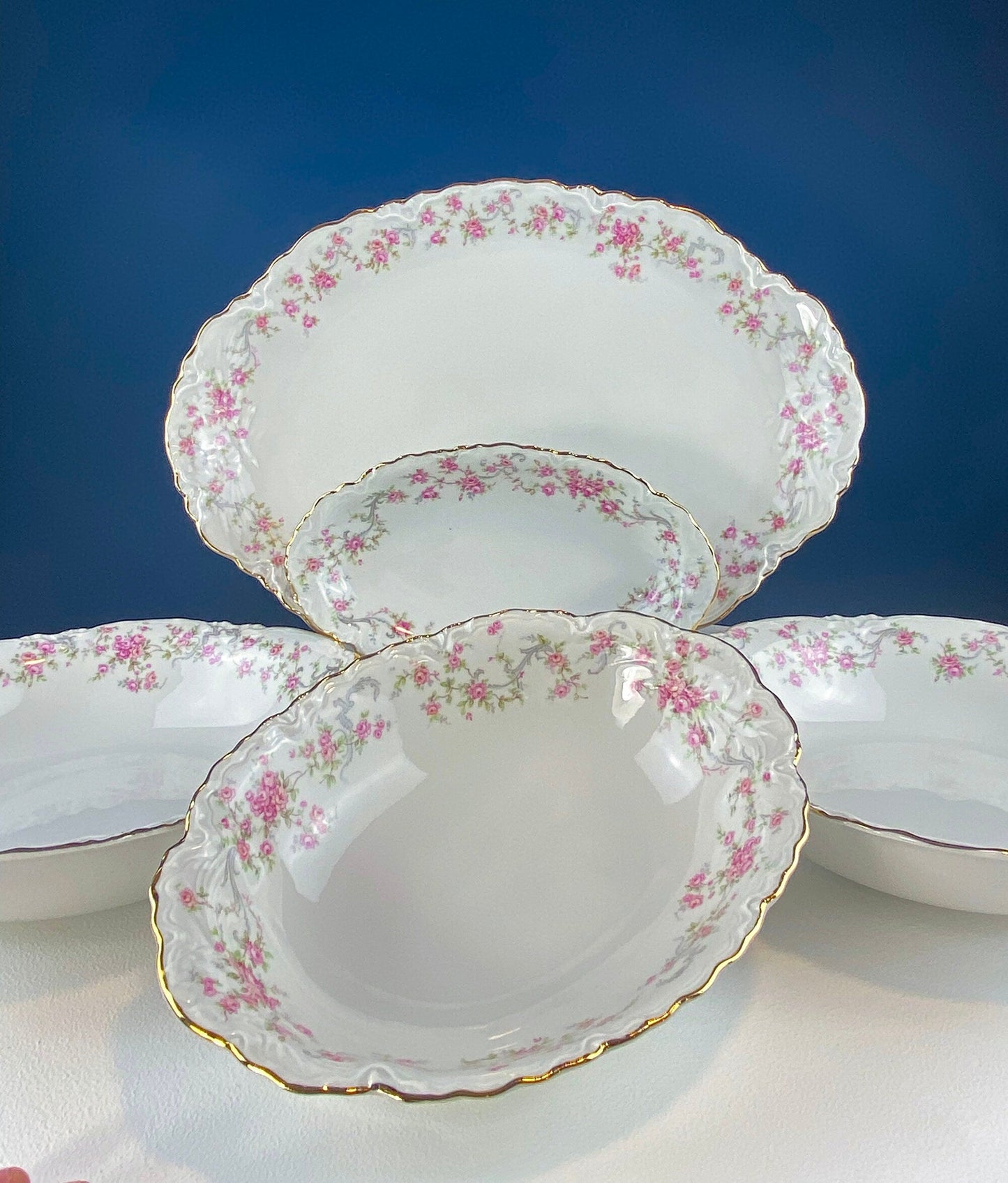 Antique Porcelain Serving Dishes. Set of Five Hutschenreuter Platters and Bowls with Pink Rose Garlands Motif.