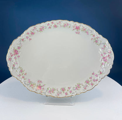 Antique Porcelain Serving Dishes. Set of Five Hutschenreuter Platters and Bowls with Pink Rose Garlands Motif.