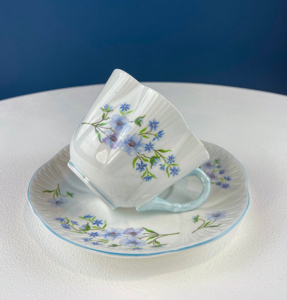 Antique Shelley Porcelain Cup and Saucer: Blue Rock Floral Pattern