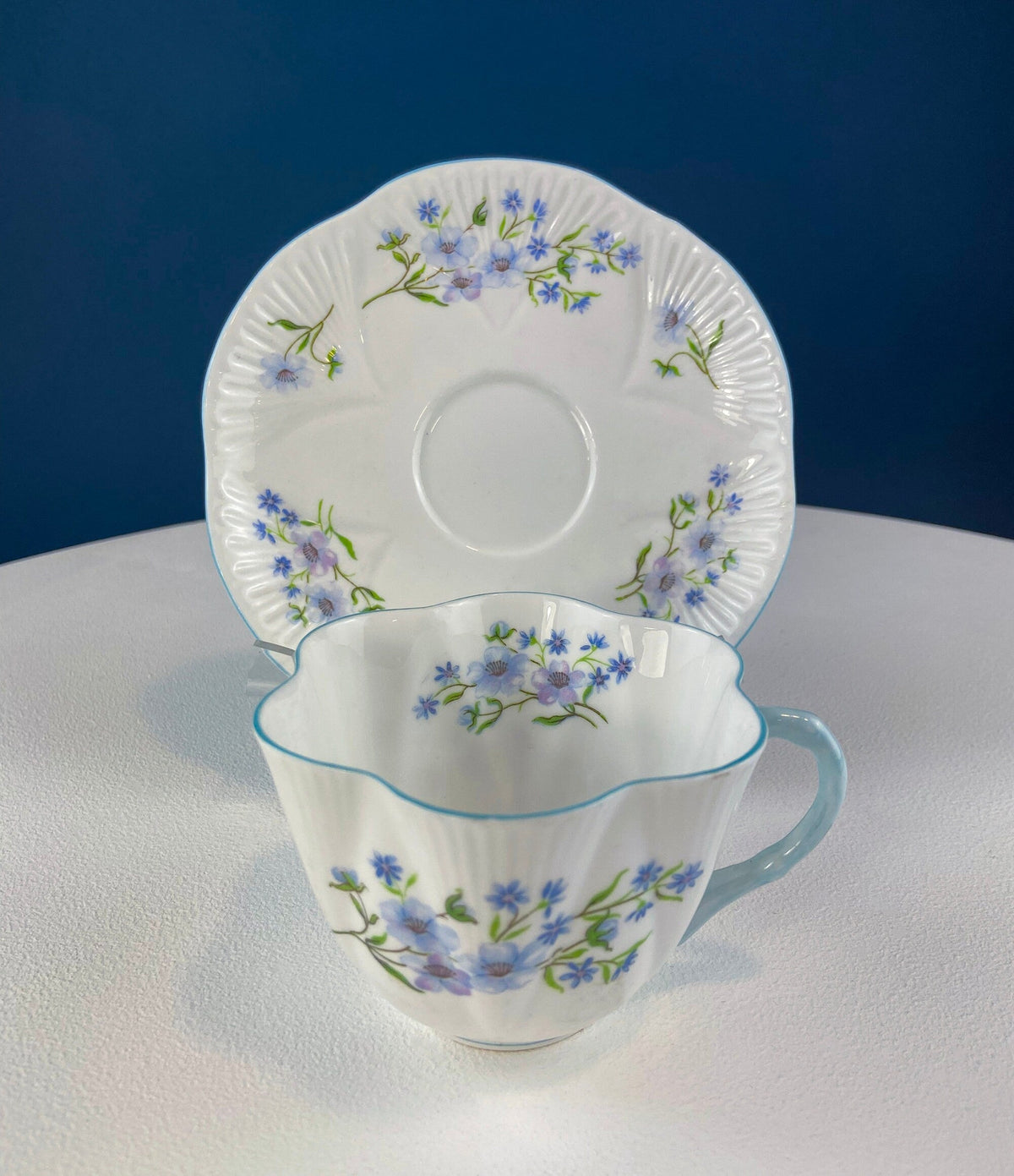 Antique Shelley Porcelain Cup and Saucer: Blue Rock Floral Pattern