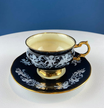 Vintage Elizabethan Fine Bone China Cup and Saucer: Handpainted Cupids