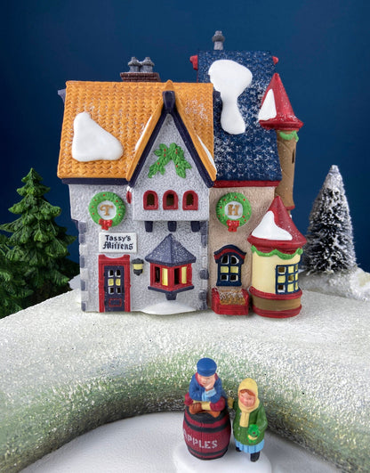 Tassy's Mittens and Hassel's Woolies by Department 56. Illuminated Christmas Village House. North Pole Series.