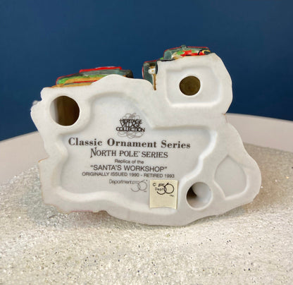 Set of 3 Tree Ornaments by Dept 56. Porcelain Hand Painted Bldgs.: Dedlock Arms, Santa's Workshop, and Dickens'Village Mill. Home or Retail.