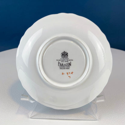 White and Gold Cup and Saucer. Paragon Porcelain, By Appointment to Her Majesty the Queen Potters. Dining Room Cabinet Display.