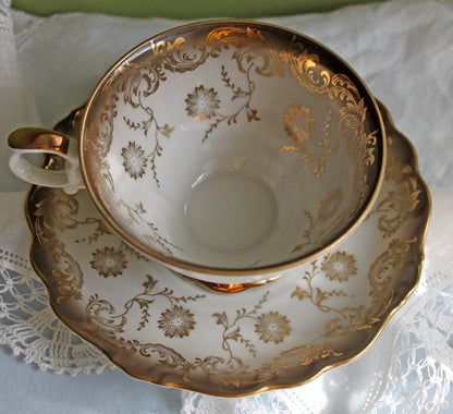 Tea Cup and Saucer by Paragon Made in England in Yellow, Gold, Pink